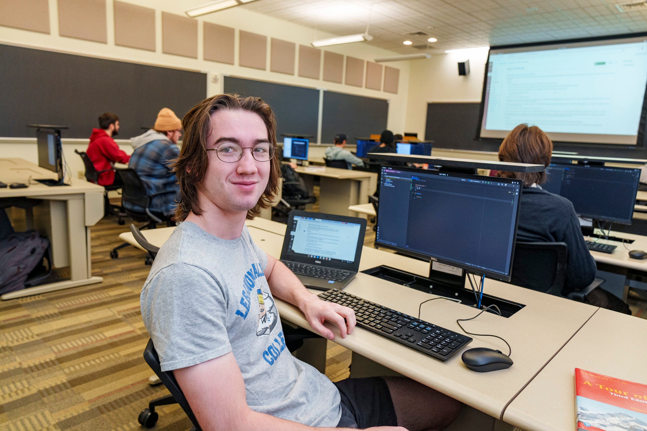 Student sits in LVC computer programming class.