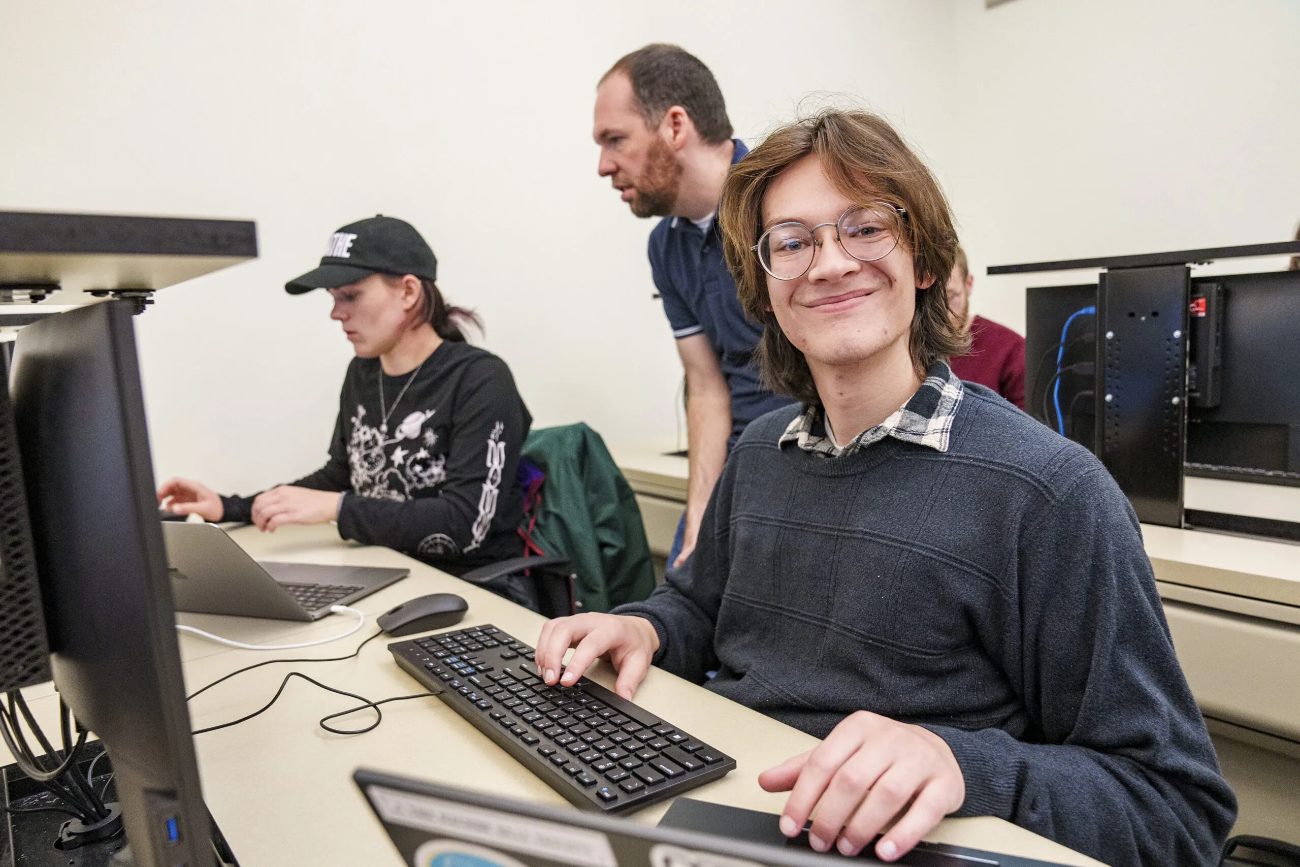 Student sits in LVC computer programming class.