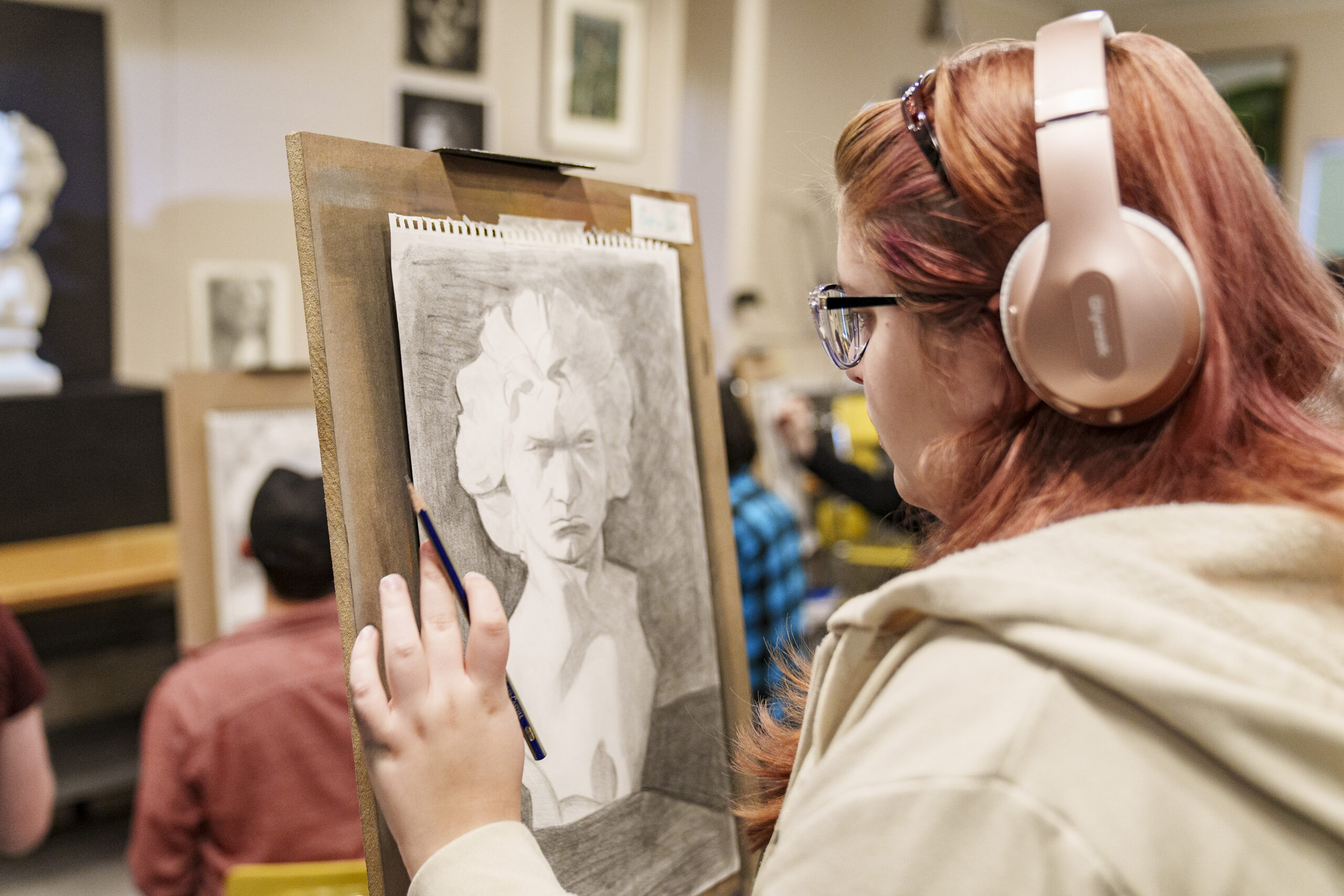LVC student works on piece during drawing class