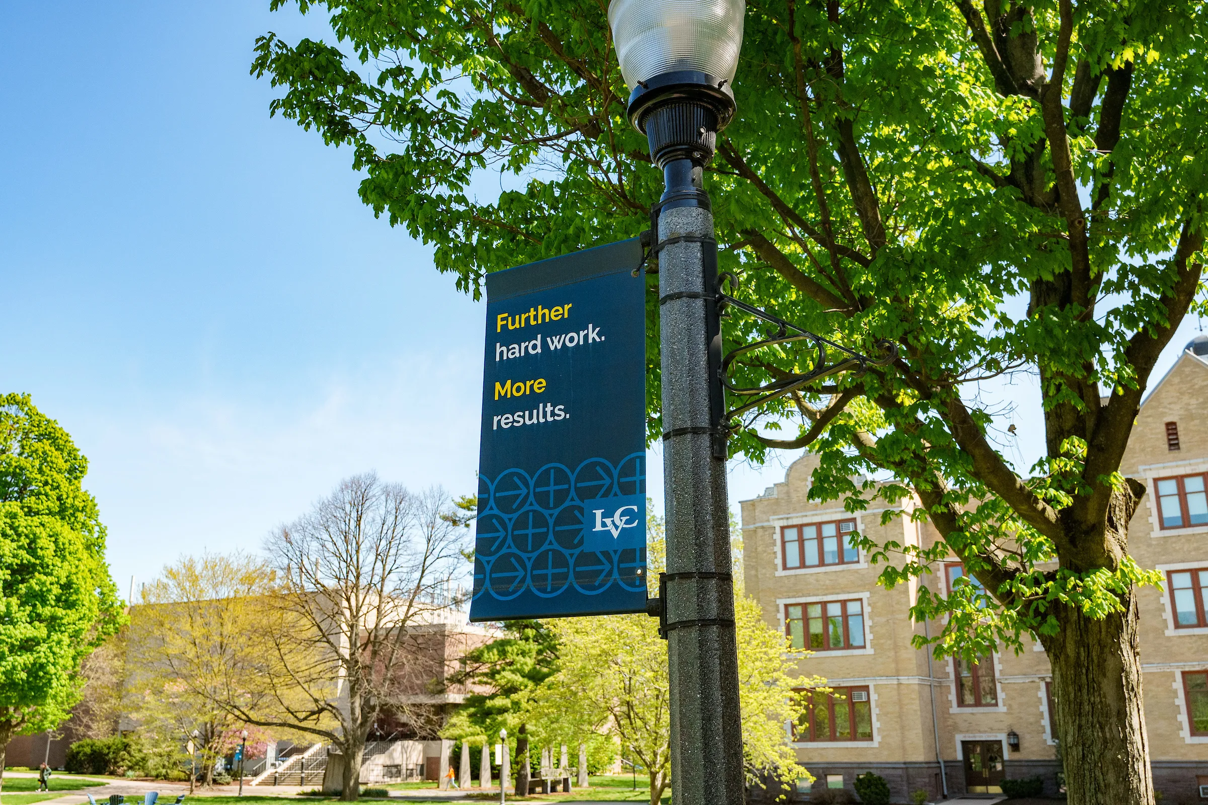 Brand signage on academic quad of campus