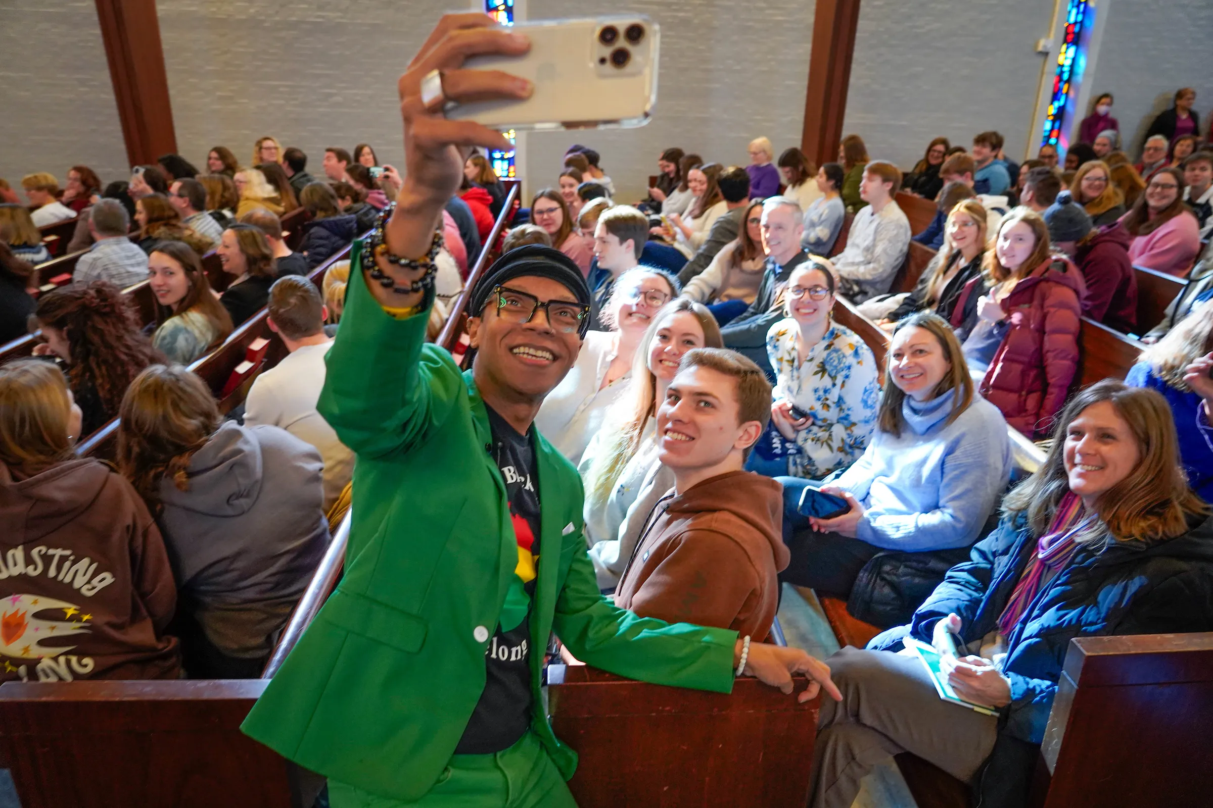 Dr. Terrell Strayhorn takes selfie with attendees at 2024 LVC Symposium on Inclusive Excellence