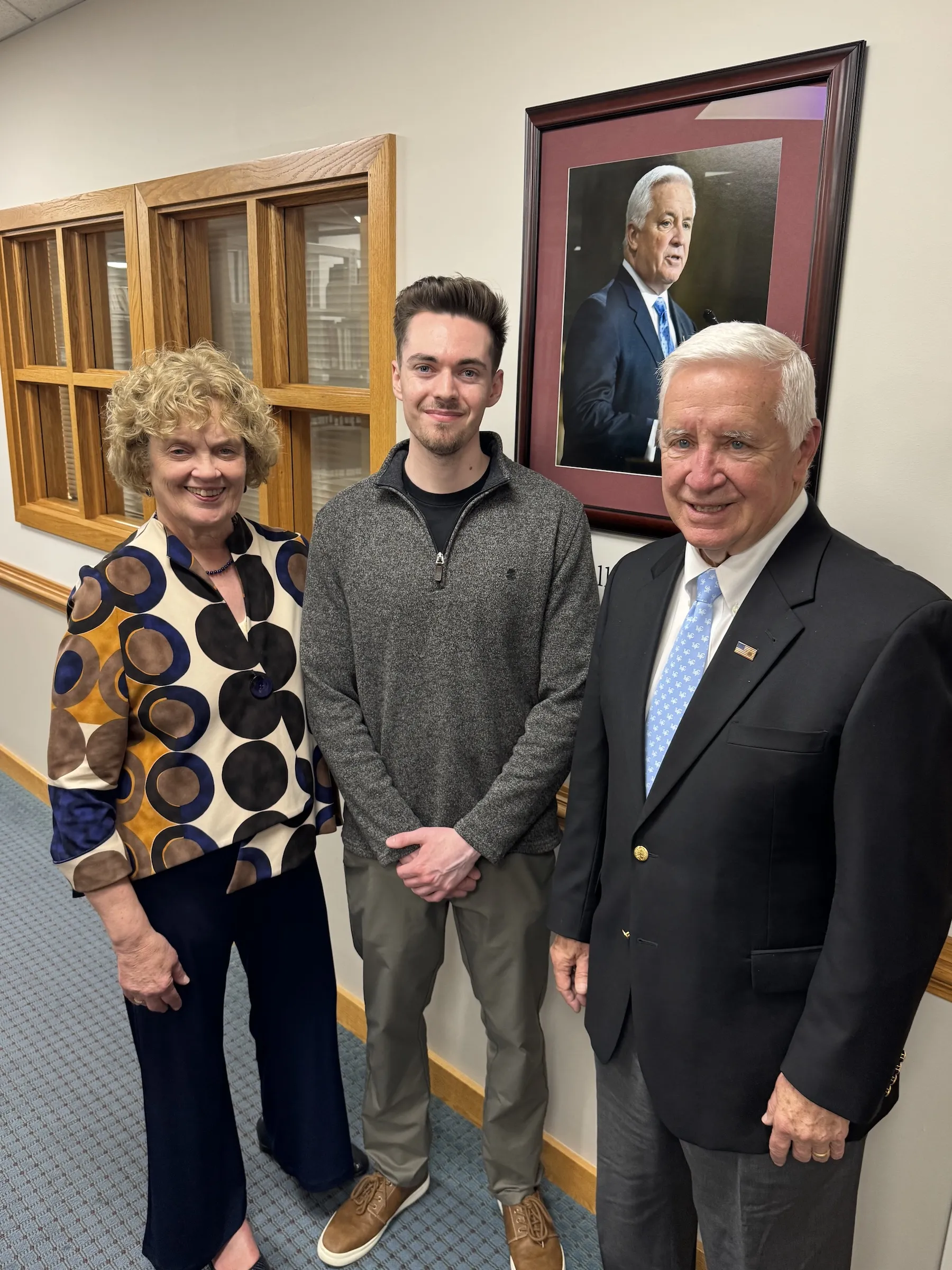 The Corbetts with archival assistant Thomas Sciscento