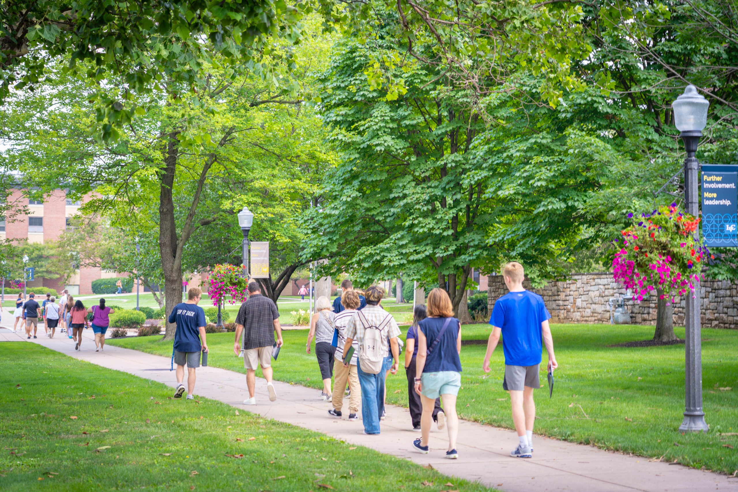 Discovery Day tour group walks campus