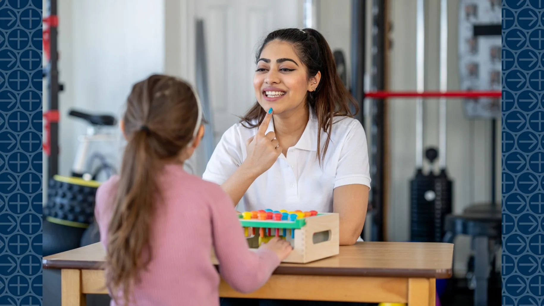 Speech language pathologist works with young patient
