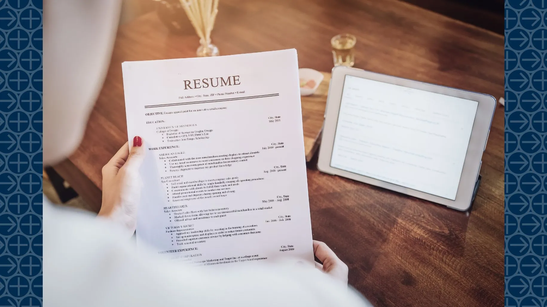 Person holds resume