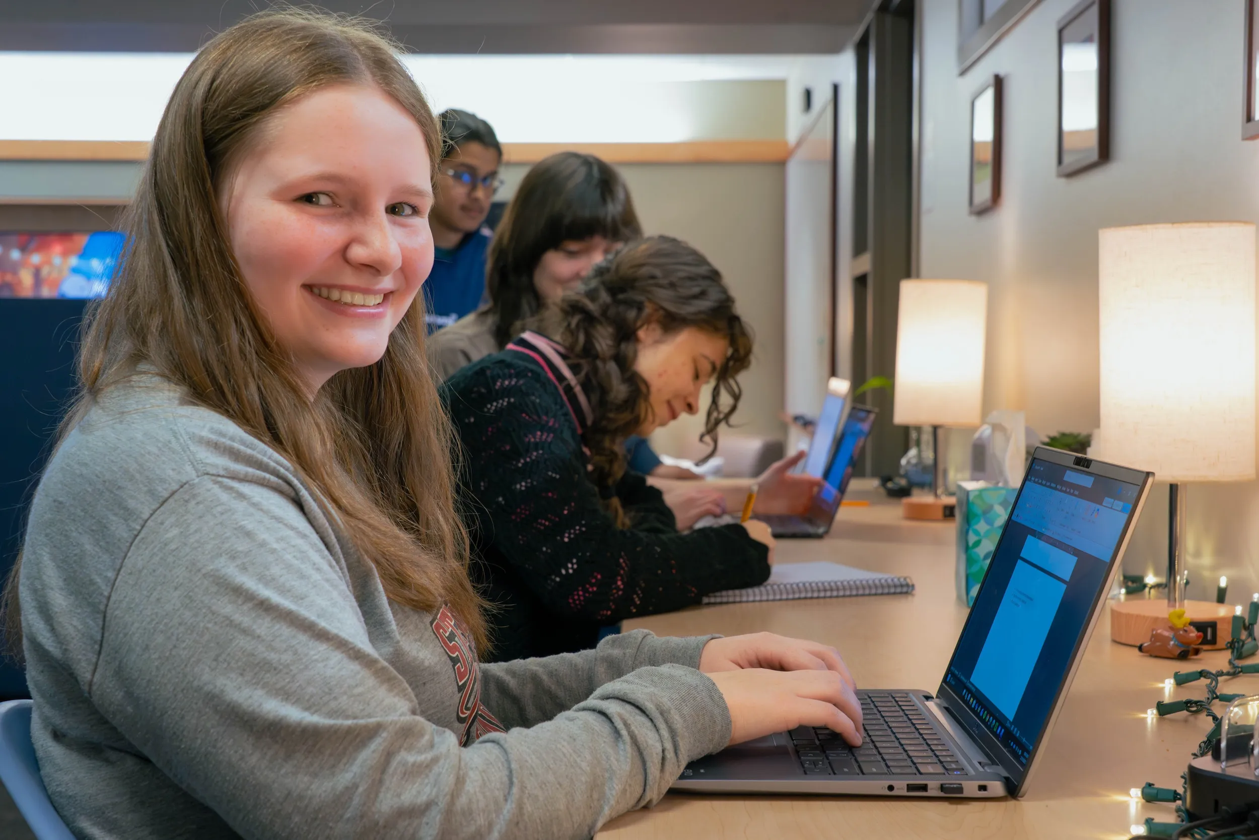 Students work at shared desk in LVC's Center for Academic Success and Exploration