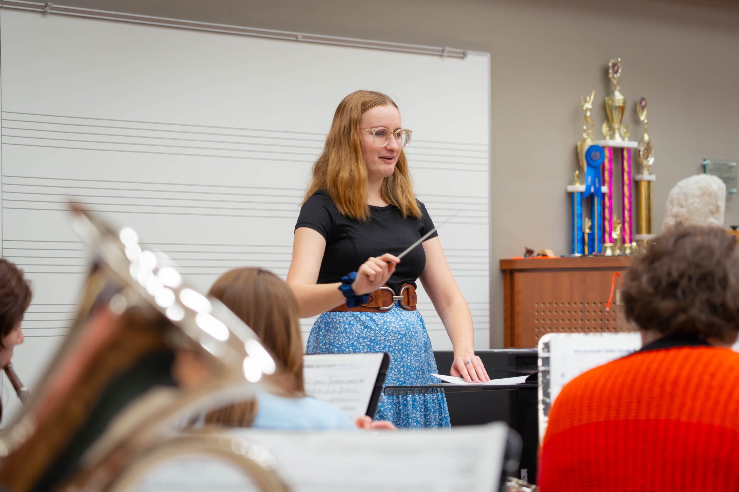 Student practices conducting during band practice