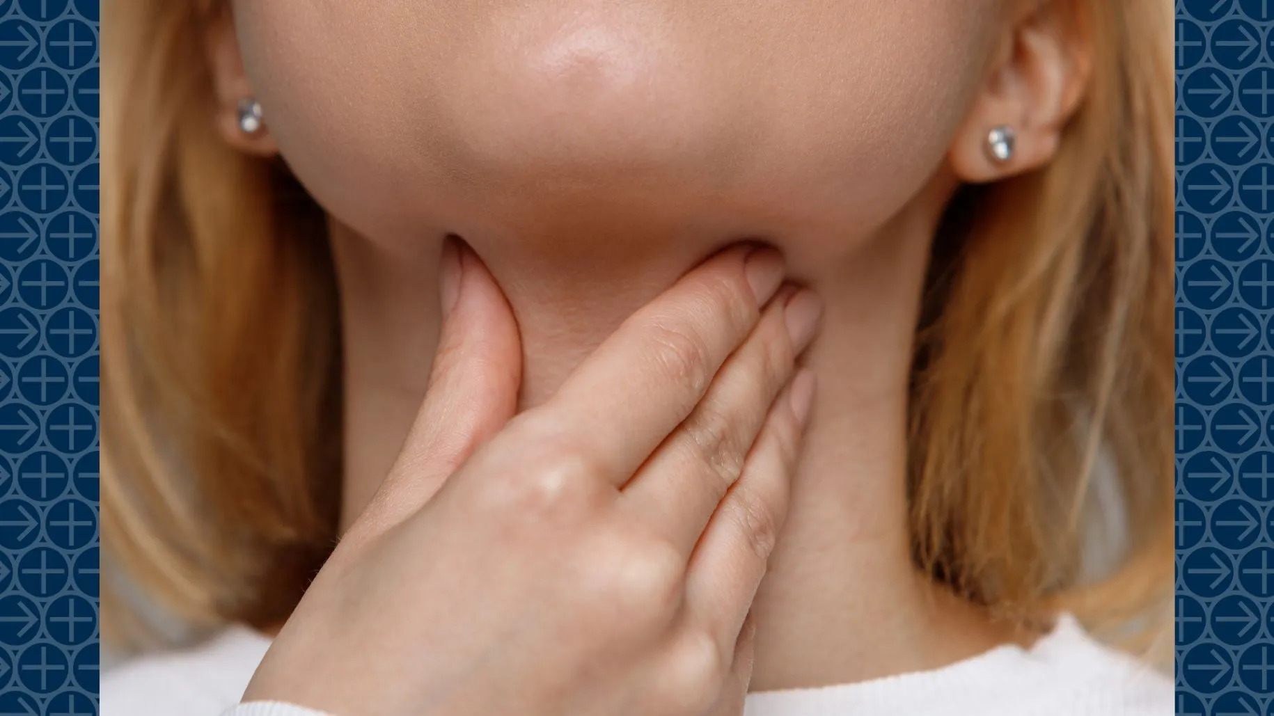 Woman touches her throat