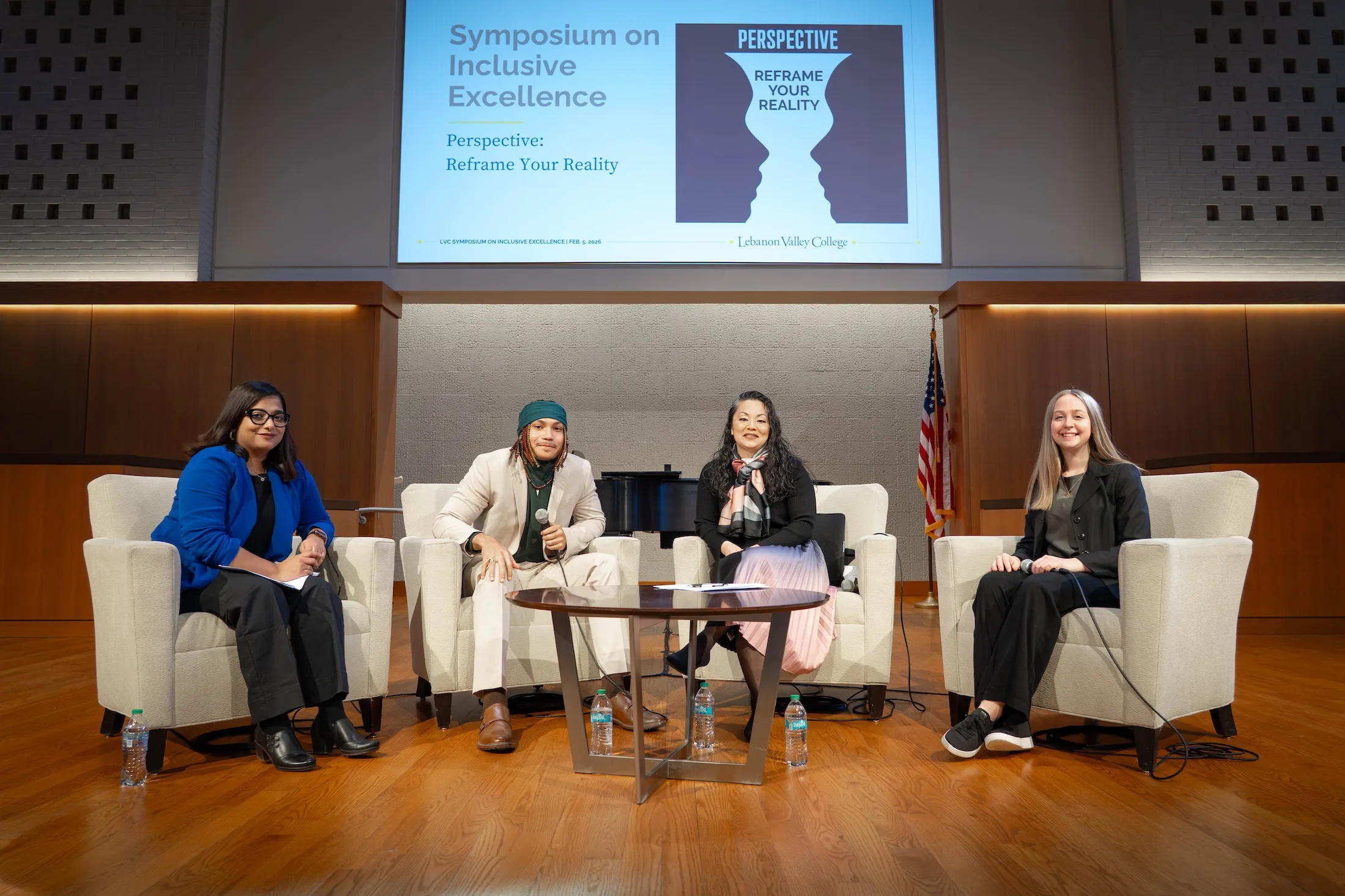 Keynote panelists sit on stage at annual LVC Symposium on Inclusive Excellence