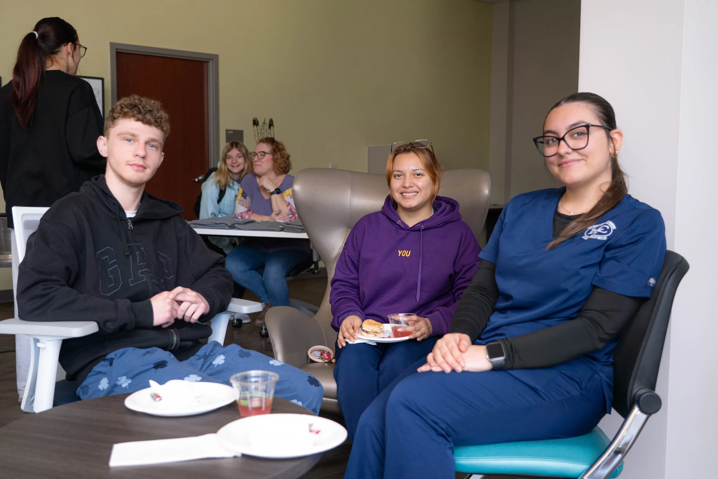 LVC first-generation students sit around table at Dutchmen First cookout event