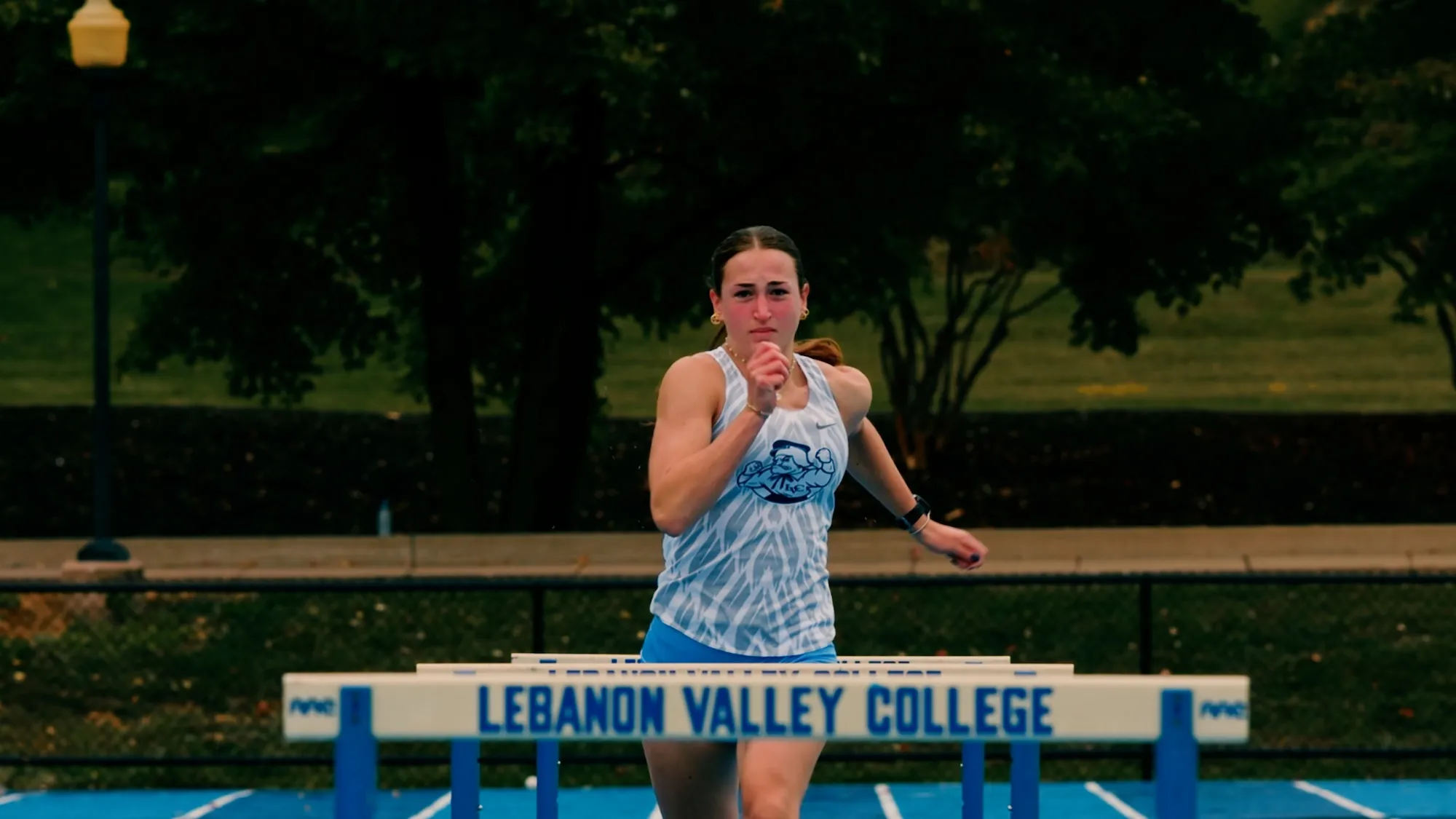 LVC track athlete runs hurdles