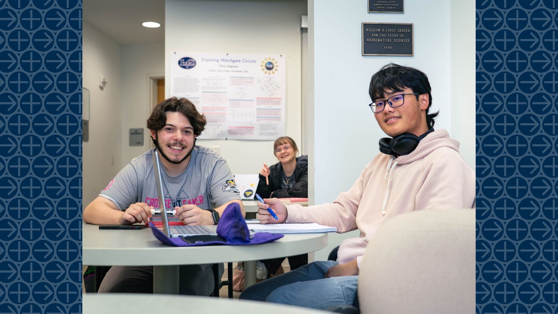 LVC Actuarial Science students sit together at table in mathematical sciences lab