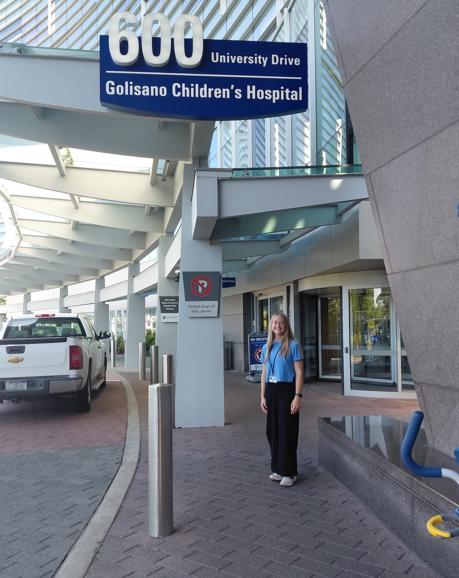 Shelly Bliss poses at her physical therapy internship site, Penn State Health Golisano Children's Hospital in Hershey